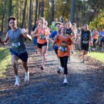 5k runners running on the trail.