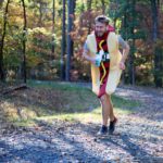 5k runner in hot dog costume running on on the trail.